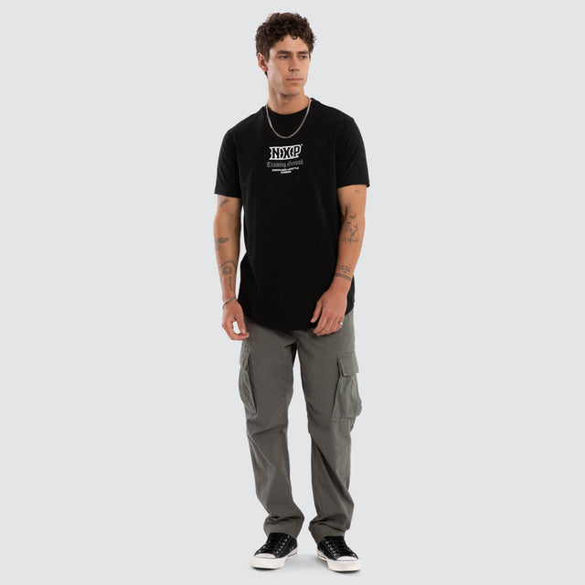 Model wears Koralyx Dual Curved Tee Jet Black T-Shirts Black – image 5
