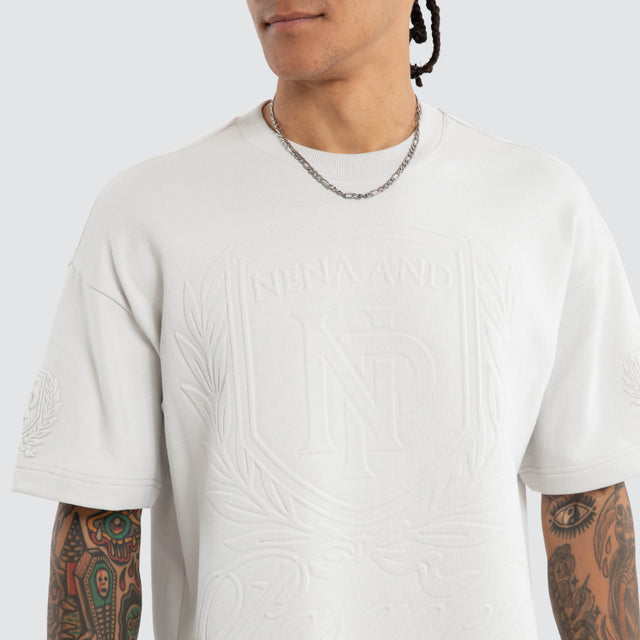 Model wears Drago Loopback Raptor Tee Glacier Grey T-Shirts Grey – image 2
