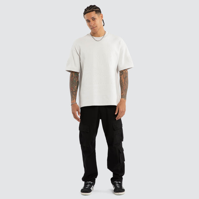 Model wears Drago Loopback Raptor Tee Glacier Grey T-Shirts Grey – image 5
