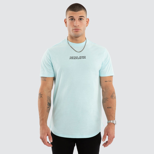 Model wears Dawnrise Curved Hem Tee Blue T-Shirts in Blue - Image 1