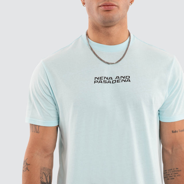 Model wears Dawnrise Curved Hem Tee Blue T-Shirts in Blue - Image 3