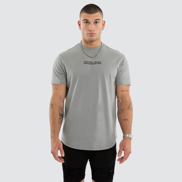 Model wears Dawnrise Curved Tee Grey T-Shirts in Grey - Image 1