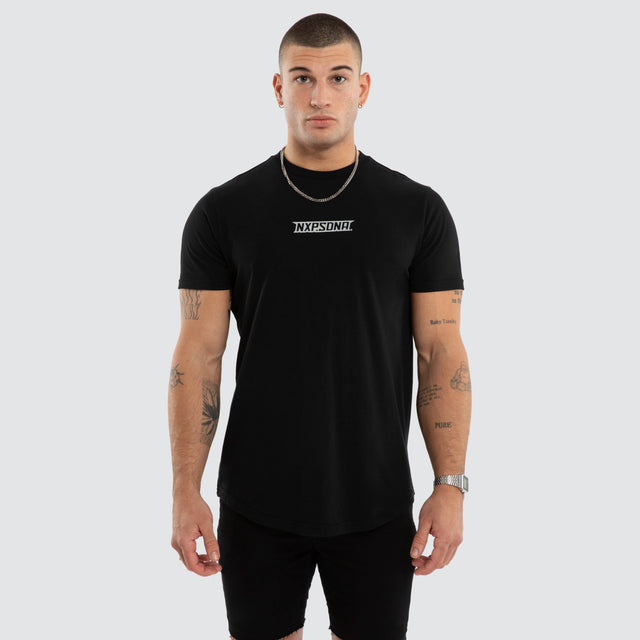 Model wears Aether Curved Hem Tee Black T-Shirts in Black - Image 2