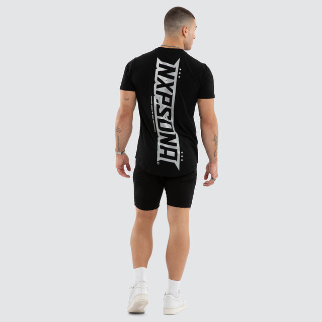 Model wears Aether Curved Hem Tee Black T-Shirts in Black - Image 5