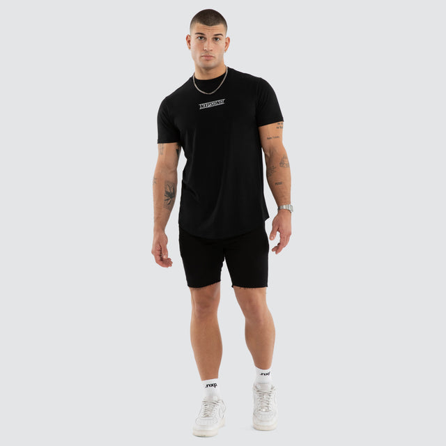 Model wears Aether Curved Hem Tee Black T-Shirts in Black - Image 4