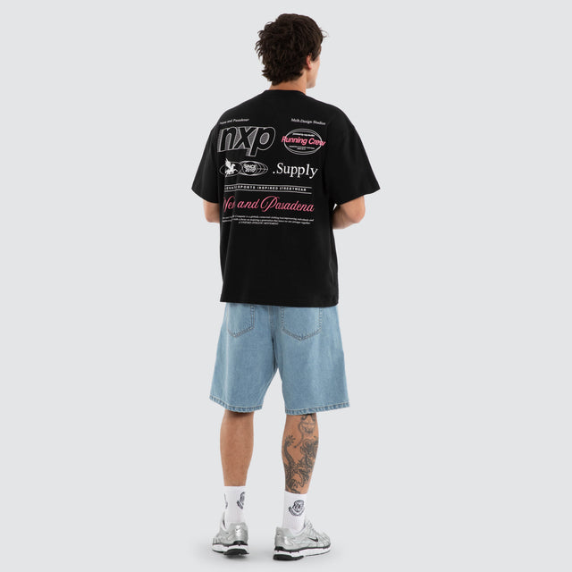 Model wears Dustypinkon Box Fit Tee Black T-Shirts in Black - Image 4
