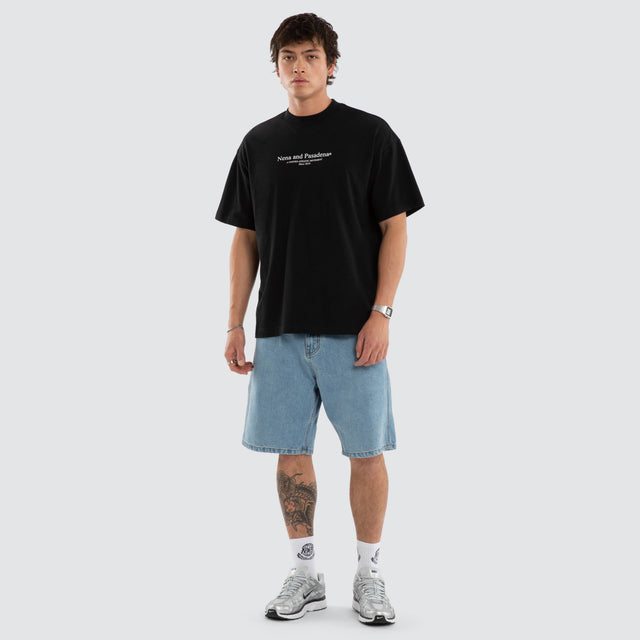 Model wears Dustypinkon Box Fit Tee Black T-Shirts in Black - Image 5