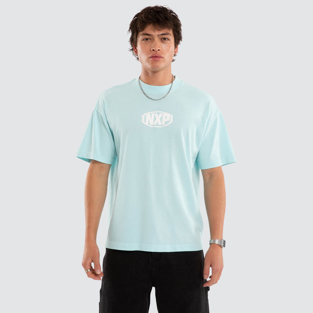 Model wears Palladium Box Fit Tee Blue T-Shirts in Blue - Image 1