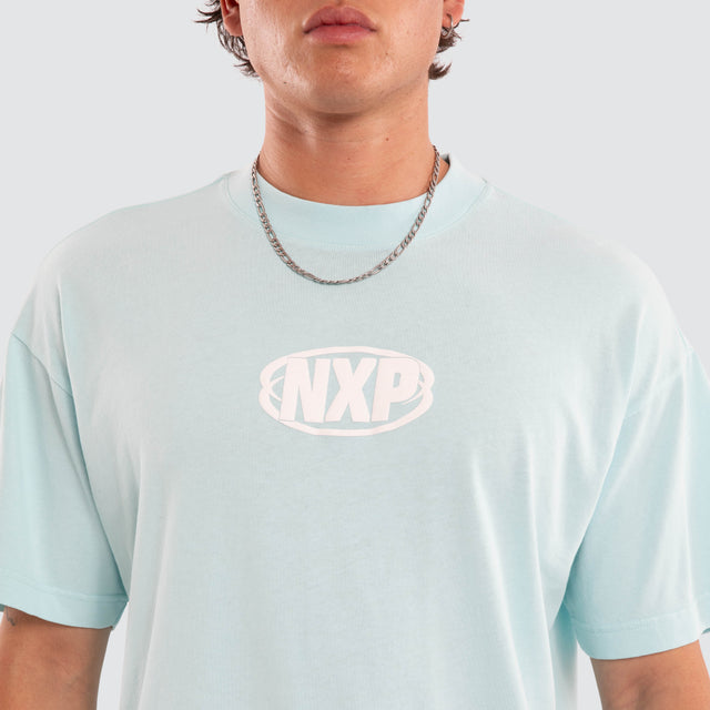 Model wears Palladium Box Fit Tee Blue T-Shirts in Blue - Image 3