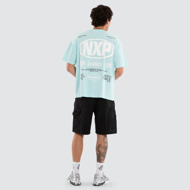 Model wears Palladium Box Fit Tee Blue T-Shirts in Blue - Image 5