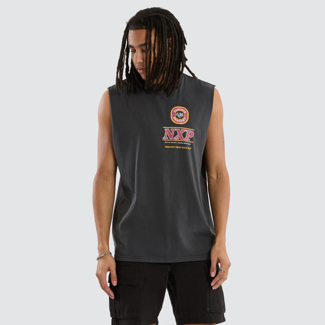 Model wears Carlton Draught Comical Relaxed Muscle Pigment Black Muscle Tees in Black - Image 1