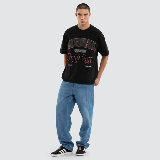 Model wears Gym Loopback Raptor Tee Anthracite Black T-Shirts in Black - Image 5