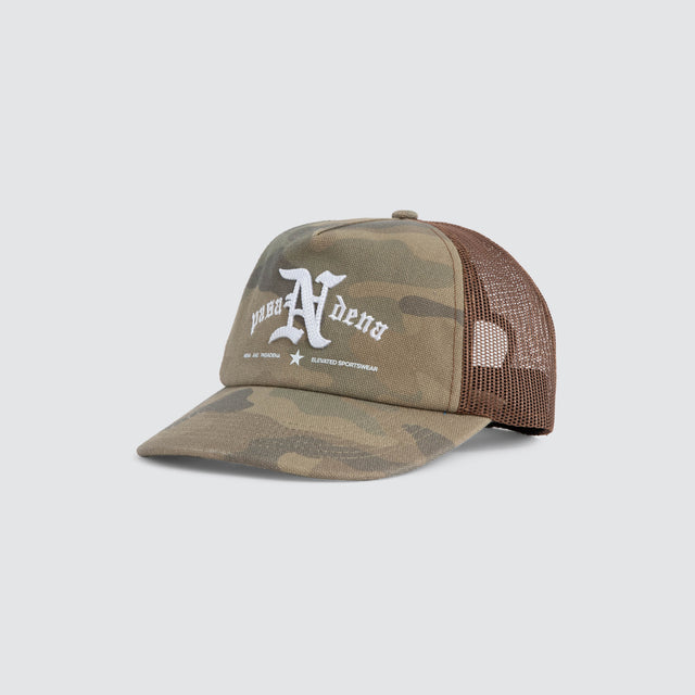 Model wears Technical Trucker Cap Airwolf Camo Caps Camo – image 3