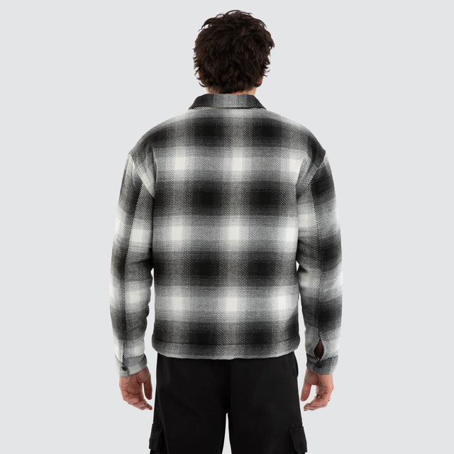 Model wears Borderline Relaxed Overshirt Black and White Check  Long Sleeve Shirts in Black - Image 3