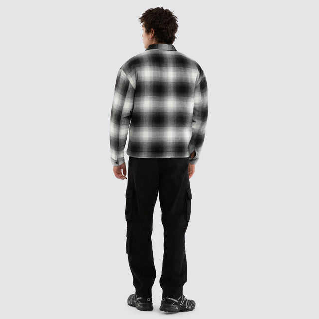 Model wears Borderline Relaxed Overshirt Black and White Check  Long Sleeve Shirts in Black - Image 5