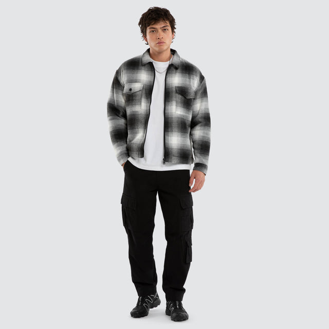 Model wears Borderline Relaxed Overshirt Black and White Check  Long Sleeve Shirts in Black - Image 4