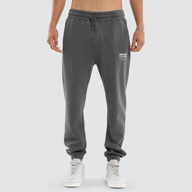 Model wears Capsule Trackpant Charcoal Trackpants in Grey - Image 3