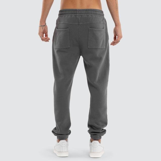 Model wears Capsule Trackpant Charcoal Trackpants in Grey - Image 2