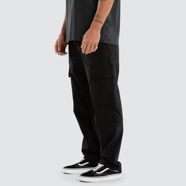 Model wears Delta EW Nylon Cargo Pant Black Pants Black – image 3