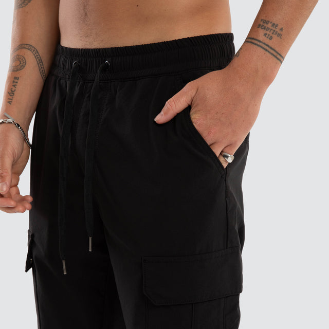 Model wears Delta EW Nylon Cargo Pant Black Pants Black – image 6