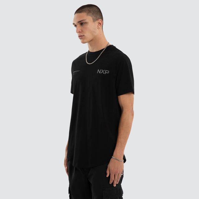 Model wears Crime Curved Hem Tee Jet Black T-Shirts in Black - Image 4