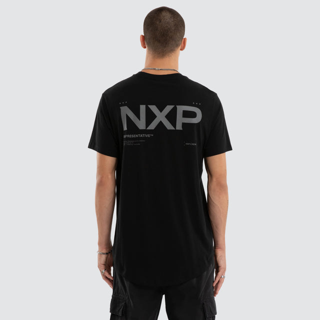 Model wears Crime Curved Hem Tee Jet Black T-Shirts in Black - Image 1