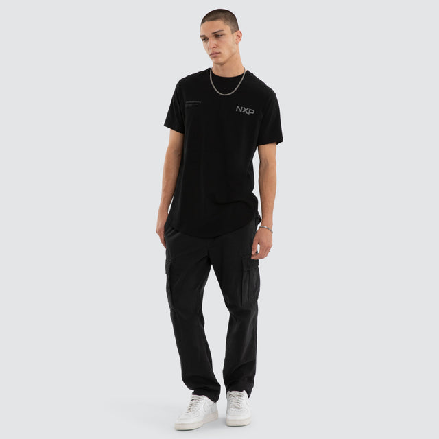 Model wears Crime Curved Hem Tee Jet Black T-Shirts in Black - Image 2