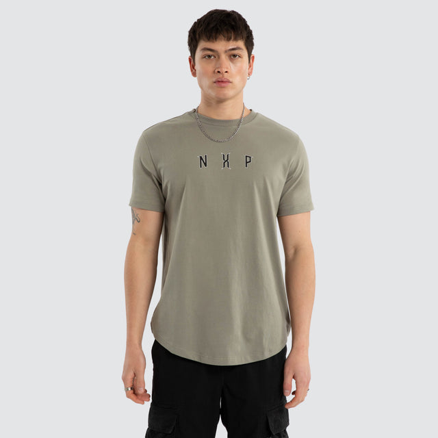 Model wears Dominate Dual Curved Tee Shadow T-Shirts White – image 1