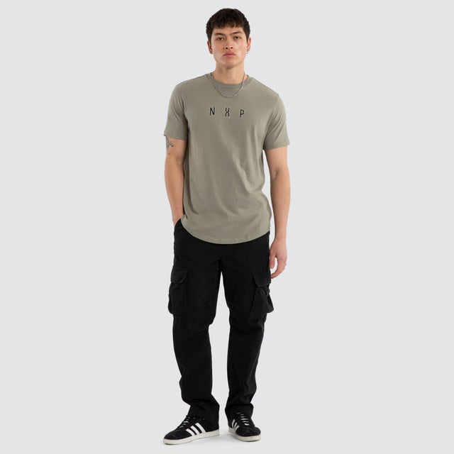 Model wears Dominate Dual Curved Tee Shadow T-Shirts White – image 4