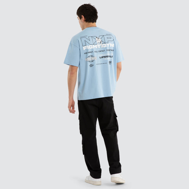 Model wears Script Raptor Tee Blue Bell T-Shirts Blue – image 5