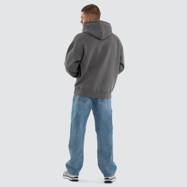 Model wears Foundation Box Fit Hoodie Charcoal Grey Hoodies in Grey - Image 4
