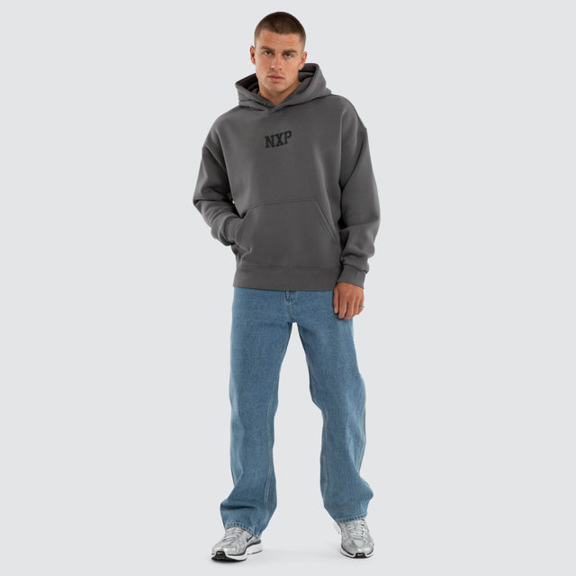 Model wears Foundation Box Fit Hoodie Charcoal Grey Hoodies in Grey - Image 5