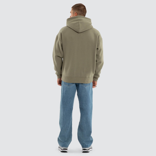 Model wears Foundation Box Fit Hoodie Khaki Green Hoodies in Green - Image 4