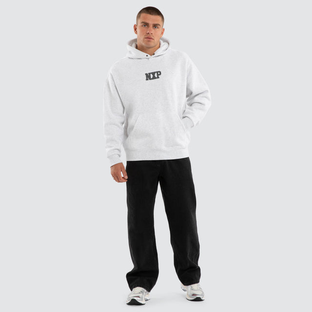 Model wears Foundation Box Fit Hoodie White Marle Hoodies in Beige - Image 5