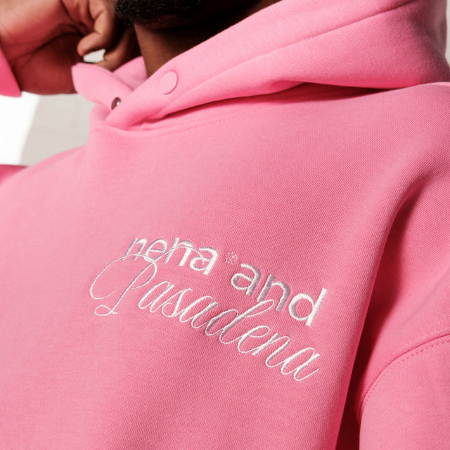 Model wears Limitless Box Fit Hoodie Pink Hoodies in Pink - Image 4