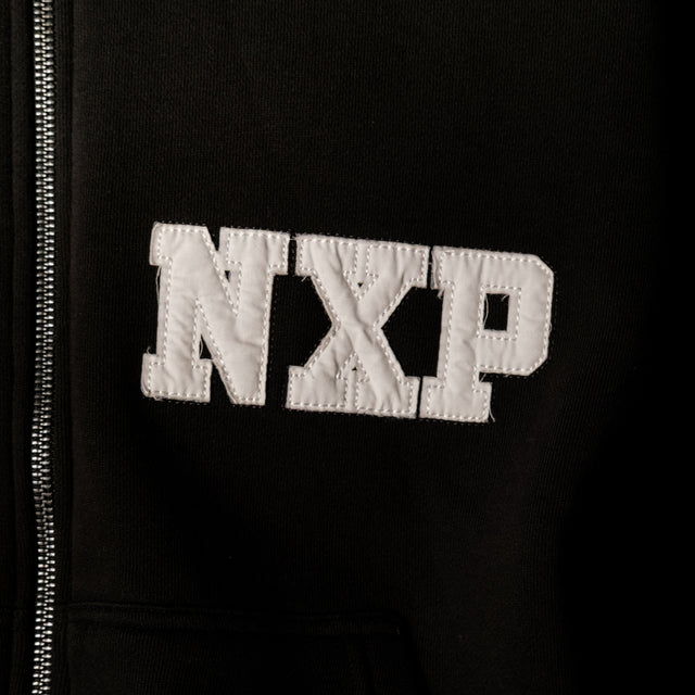 Model wears Realign Street Zip Hoodie Jet Black Hoodies in Black - Image 3