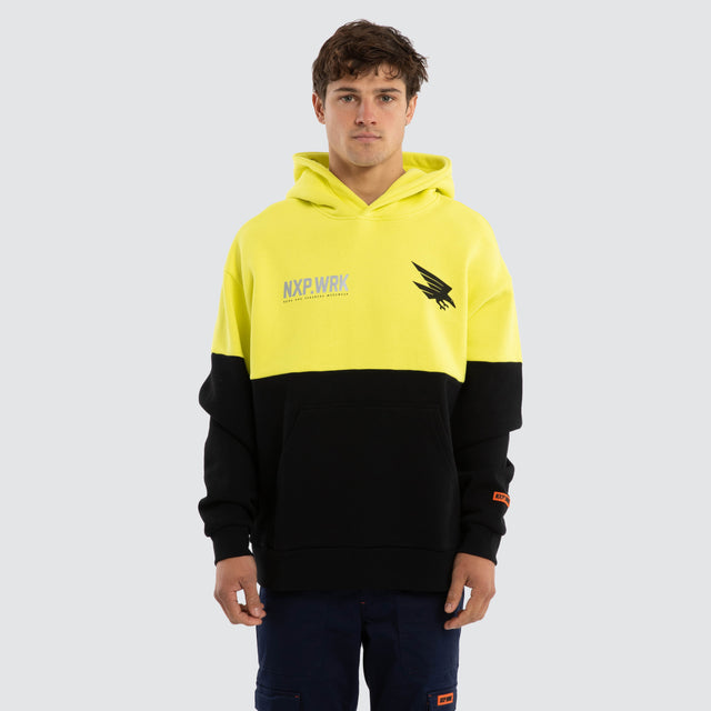 Model wears Adelaide Crows Block Hoodie Yellow Black Hoodies in Yellow - Image 1