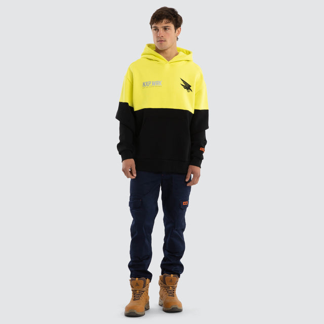 Model wears Adelaide Crows Block Hoodie Yellow Black Hoodies in Yellow - Image 5
