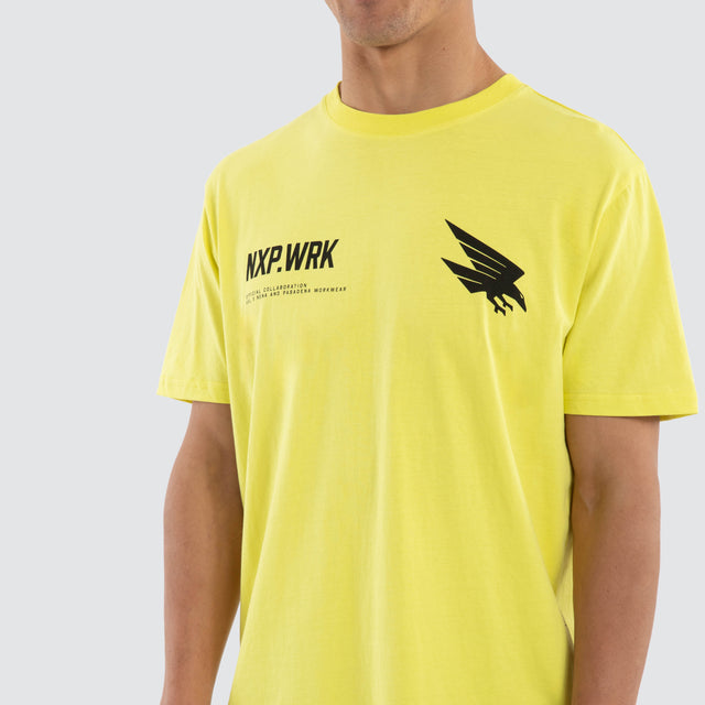 Model wears Adelaide Crows Ethic Tee Yellow T-Shirts in Yellow - Image 3