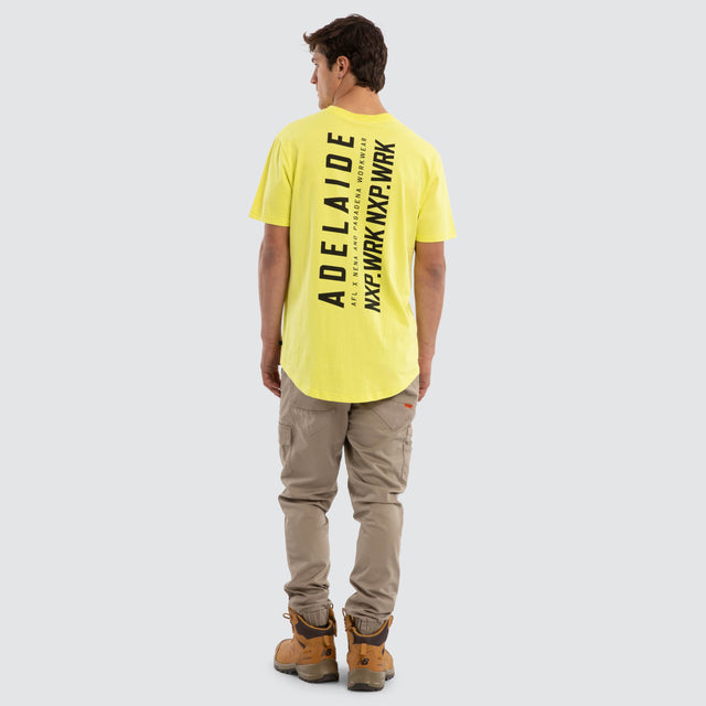 Model wears Adelaide Crows Ethic Tee Yellow T-Shirts in Yellow - Image 4