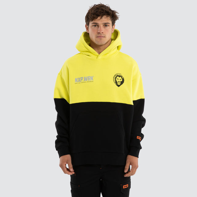 Model wears Brisbane Lions Block Hoodie Yellow Black Hoodies in Yellow - Image 1