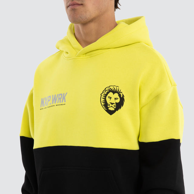 Model wears Brisbane Lions Block Hoodie Yellow Black Hoodies in Yellow - Image 3