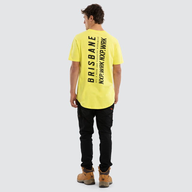 Model wears Brisbane Lions Ethic Tee Yellow T-Shirts in Yellow - Image 4