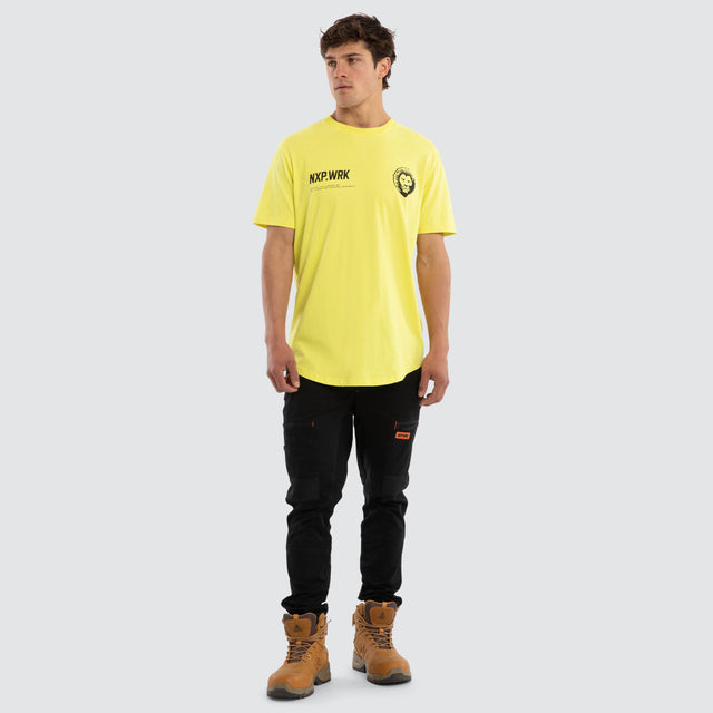 Model wears Brisbane Lions Ethic Tee Yellow T-Shirts in Yellow - Image 5