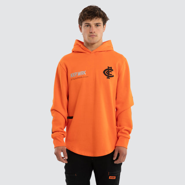Model wears Carlton Blues Admission Hoodie Orange Hoodies in Orange - Image 1