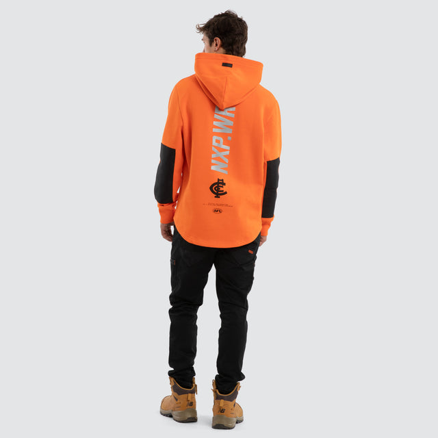 Model wears Carlton Blues Admission Hoodie Orange Hoodies in Orange - Image 3