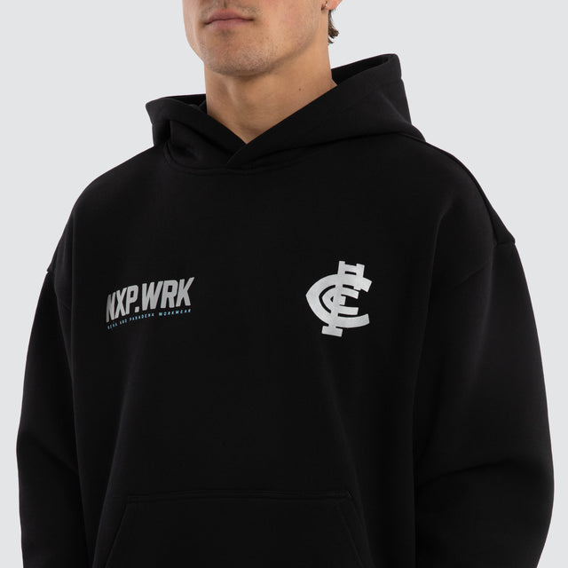 Model wears Carlton Blues Subject Hoodie Jet Black Hoodies in Black - Image 4