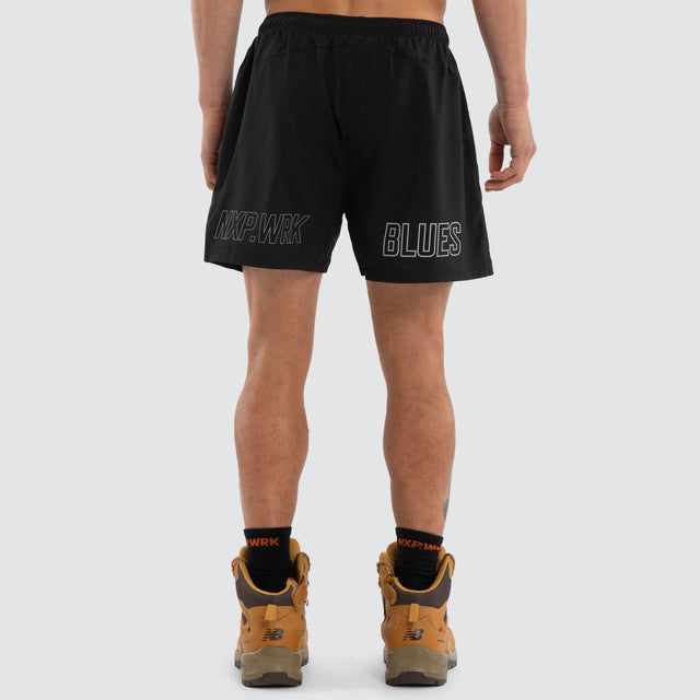 Model wears Carlton Blues Contract Short Jet Black Shorts in Black - Image 2