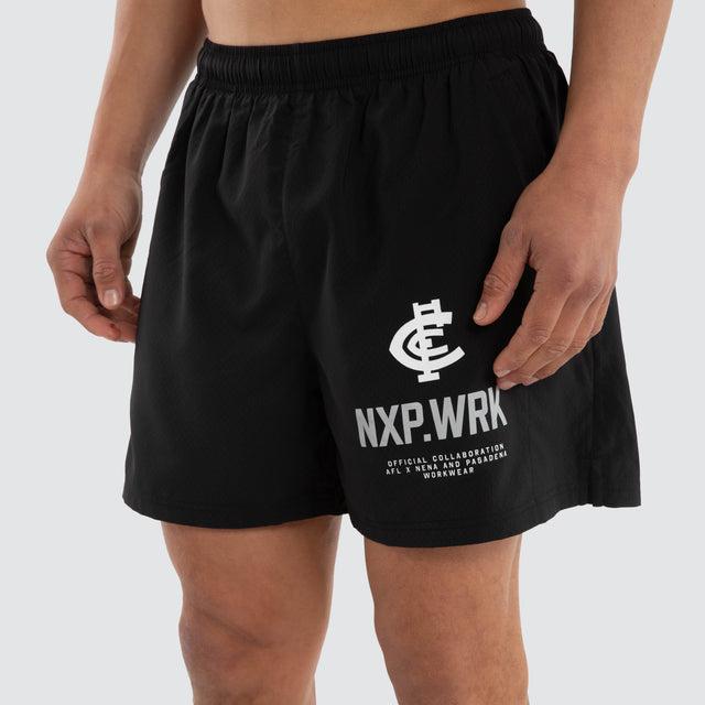Model wears Carlton Blues Contract Short Jet Black Shorts in Black - Image 3