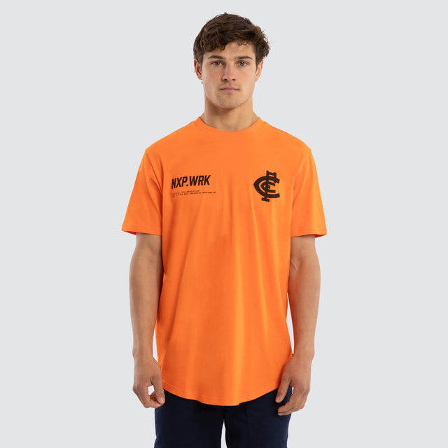 Model wears Carlton Blues Ethic Tee Work Orange T-Shirts in Orange - Image 1